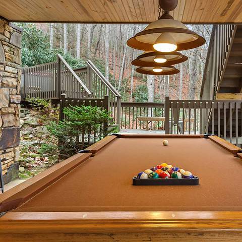 Pool table on covered porch.