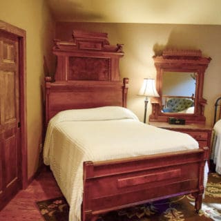 Walnut bed at The Huntley - The Cove at Fairview Vacation Rentals - Asheville NC