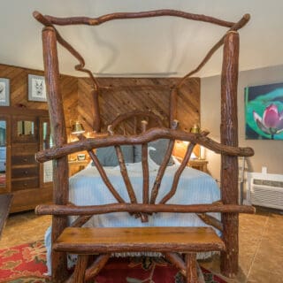 My Roundette features a handmade sassafras canopy bed.