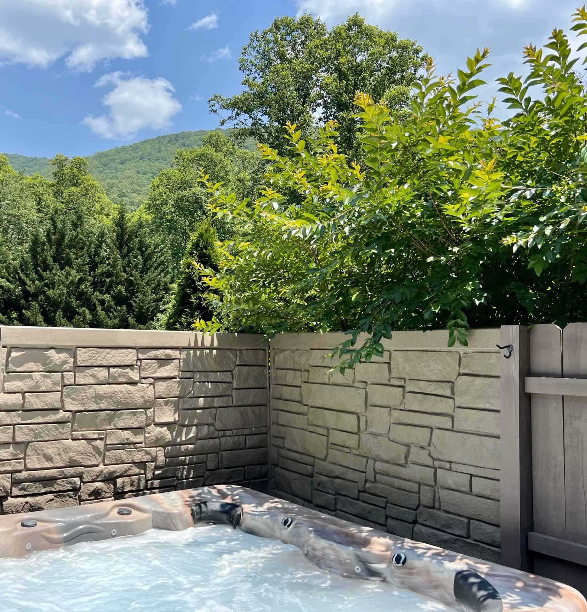 Relax in the spacious 5 person hot tub! - The Cove at Fairview Vacation Rentals - Asheville NC