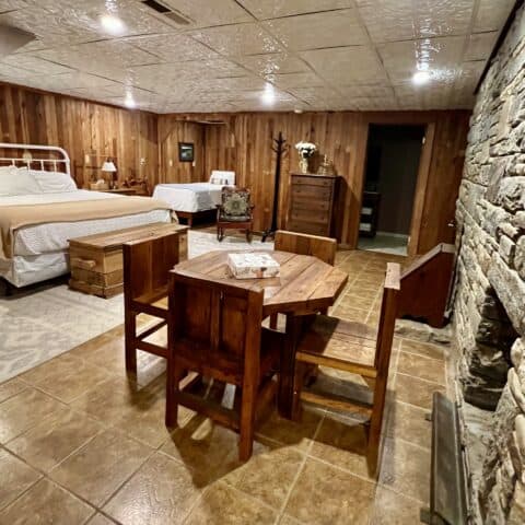 Enjoy a board game on this handmade Wormy Chestnut table - The Cove at Fairview - Vacation Rentals - Asheville, NC