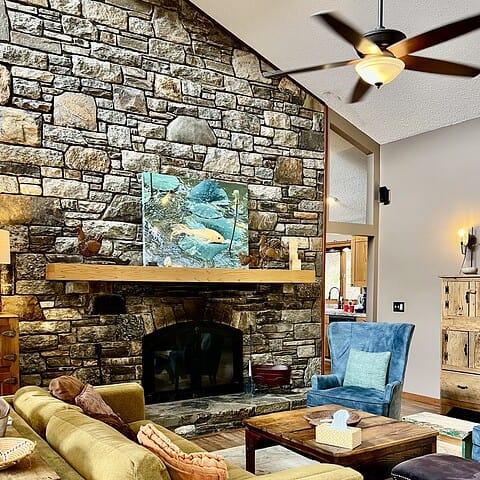 Fireplace in living room was built by a third-generation stone mason - The Cove at Fairview - Vacation Rentals - Asheville, NC
