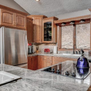 Fully equipped kitchen at Our House - The Cove at Fairview Vacation Rentals - Asheville NC